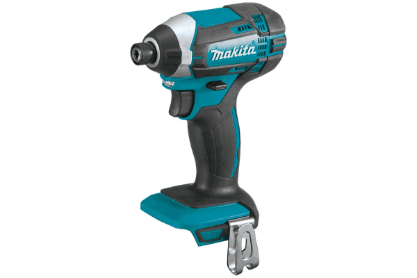 Image showcases the Makita DTD152Z, an 18V LXT Impact Driver, featuring a compact and lightweight design in the distinctive teal and black color scheme of Makita tools. This powerful impact driver is designed for driving screws and tightening nuts with high efficiency, thanks to its high torque output. It includes a variable speed control trigger for precise operation, an LED light to illuminate the work area, and a quick-change chuck for easy bit changes. The ergonomic shape and rubberized soft grip reduce fatigue during extended use, making it suitable for professionals and DIY enthusiasts alike. Ideal for a wide range of fastening tasks in various materials